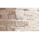 Close-up of Ivory Travertine Ledger Corner showing splitface texture and warm color variation