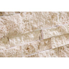 Flat view of Ivory Travertine Splitface Ledger Panel 6x24 with natural texture