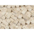 Close-up of 1x1 Ivory Travertine tiles showing textured splitface finish