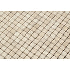 Close-up of Ivory Travertine Tumbled Mosaic 5/8"x5/8" showing surface texture and soft-edged finish