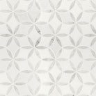 Close-up view highlighting La Fleur’s waterjet floral detailing in polished marble