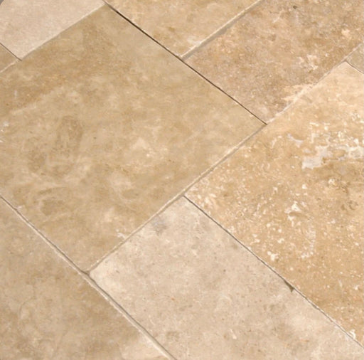 Close-up of Light Walnut Travertine showing texture and walnut beige tones
