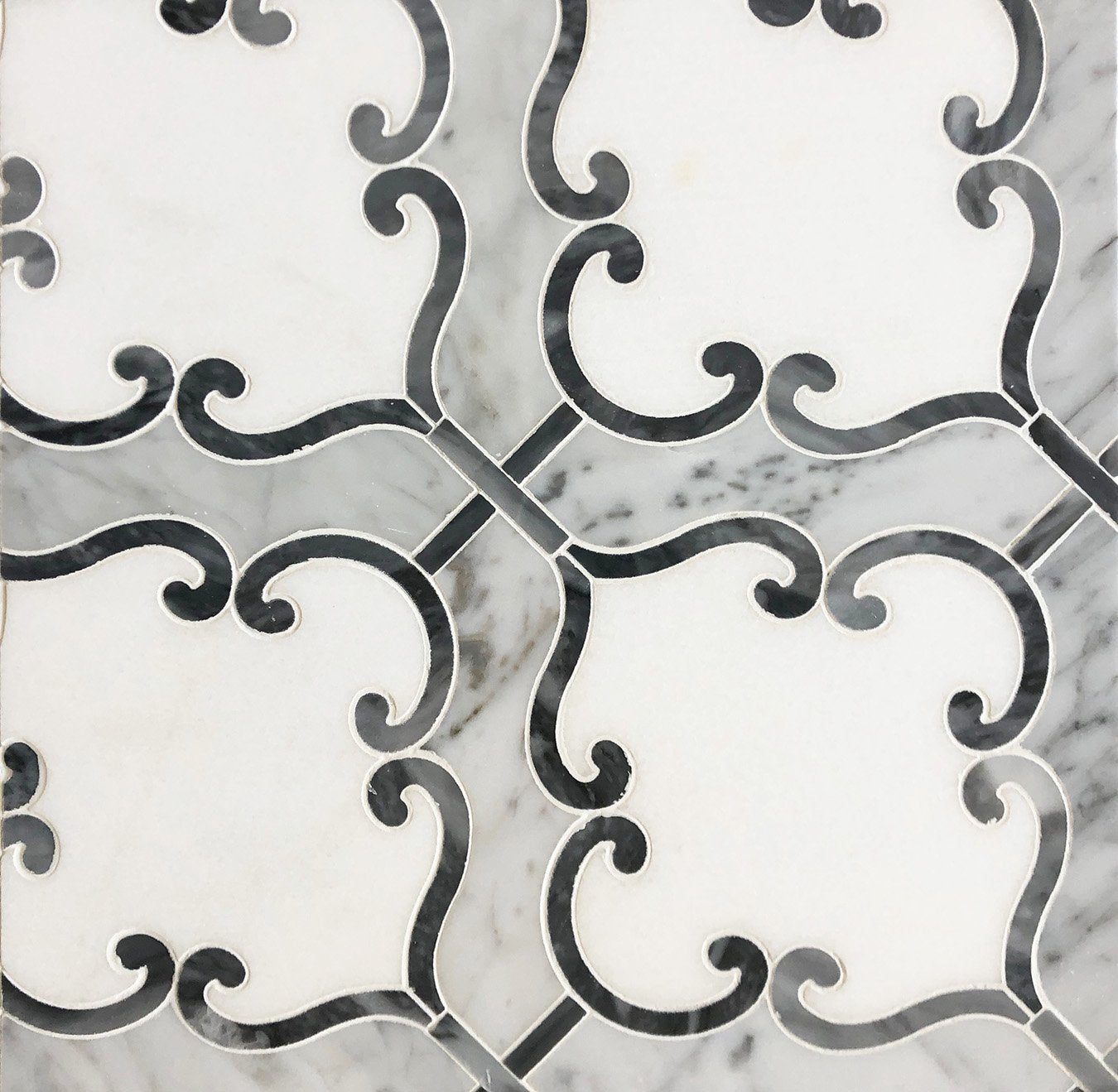 Flat lay of Thassos White Lyon waterjet mosaic tile with polished marble finish