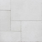 Flat view of Mayra Limestone Versailles Pattern with brushed finish and chiseled edges