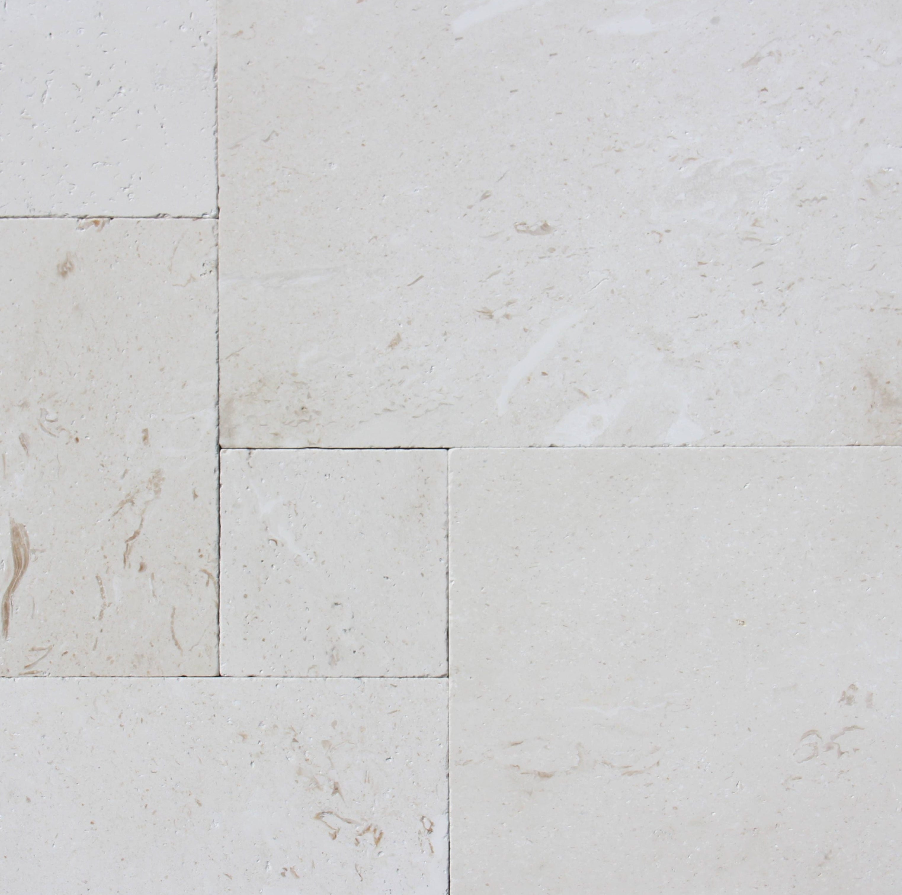 Mayra White Limestone Pavers in Versailles pattern with tumbled finish

