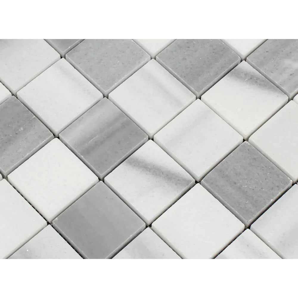 Close-up of 2x2 Mink Marble Mosaic showing polished finish and veining