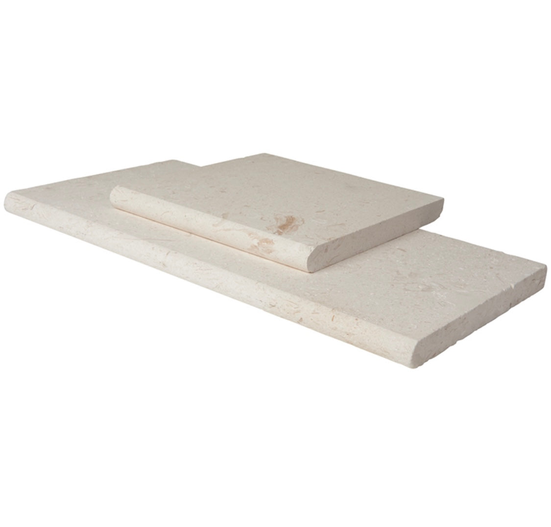 Edge of Myra Limestone Pool Coping showing soft speckled texture and 2” thickness