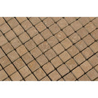 Close-up of Noce Travertine 1x1 tumbled tile surface
