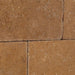 Rustic textured surface of Noce Travertine 3x6 tile