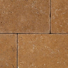 Rustic textured surface of Noce Travertine 3x6 tile