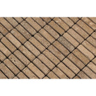 Detailed view of Noce Travertine 5/8x2 mosaic texture