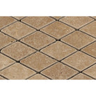 Close-up of Noce Travertine diamond tumbled mosaic finish