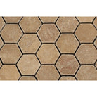 Detailed view of tumbled Noce Travertine hexagon tiles showing rustic texture