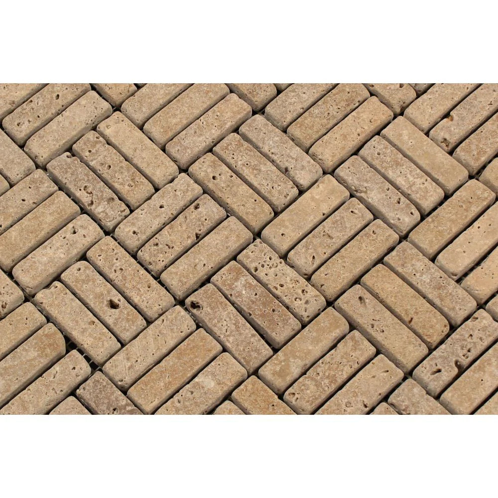 Close-up of Noce Travertine mosaic showing texture and rich brown tones