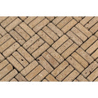 Close-up of Noce Travertine mosaic showing texture and rich brown tones