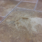 Rustic chocolate tone natural stone tile pattern