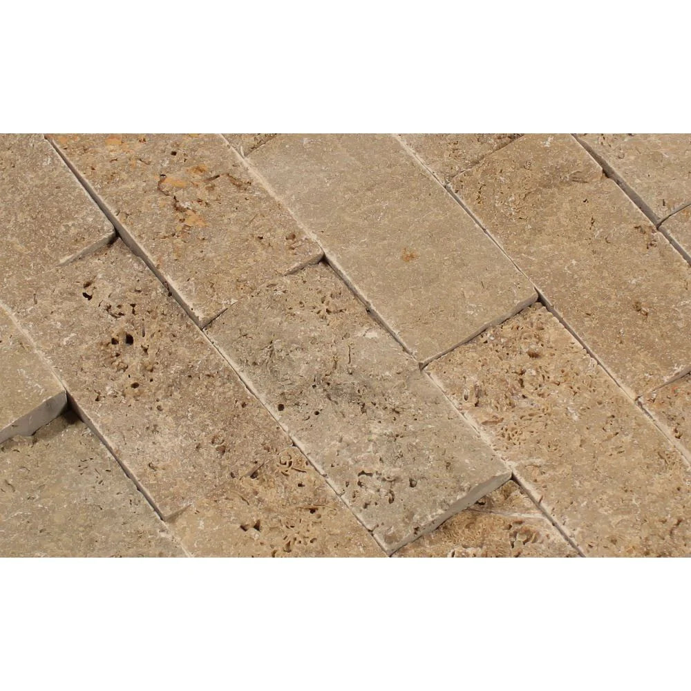 Close-up of Noche Travertine 2x4 Mosaic showing split face texture and rich brown hues