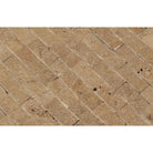Close-up of Noche Travertine Splitface finish showing textured surface and earthy variation