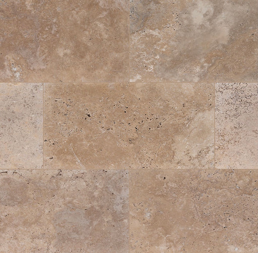 Close-up of Noche Travertine showing tumbled surface texture and walnut veining

