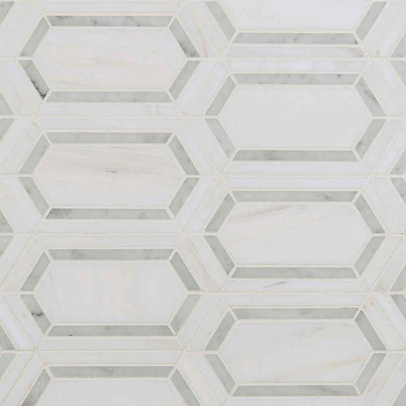 Close-up view showing polished marble texture and fine picket waterjet design