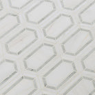 Flat lay of Pavilion Picket waterjet mosaic tile in gray and white polished marble