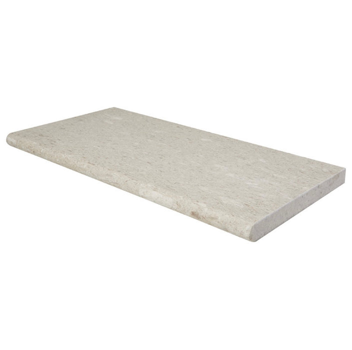 Close-up of Pearl Limestone showing cream tones and bullnose edge detail