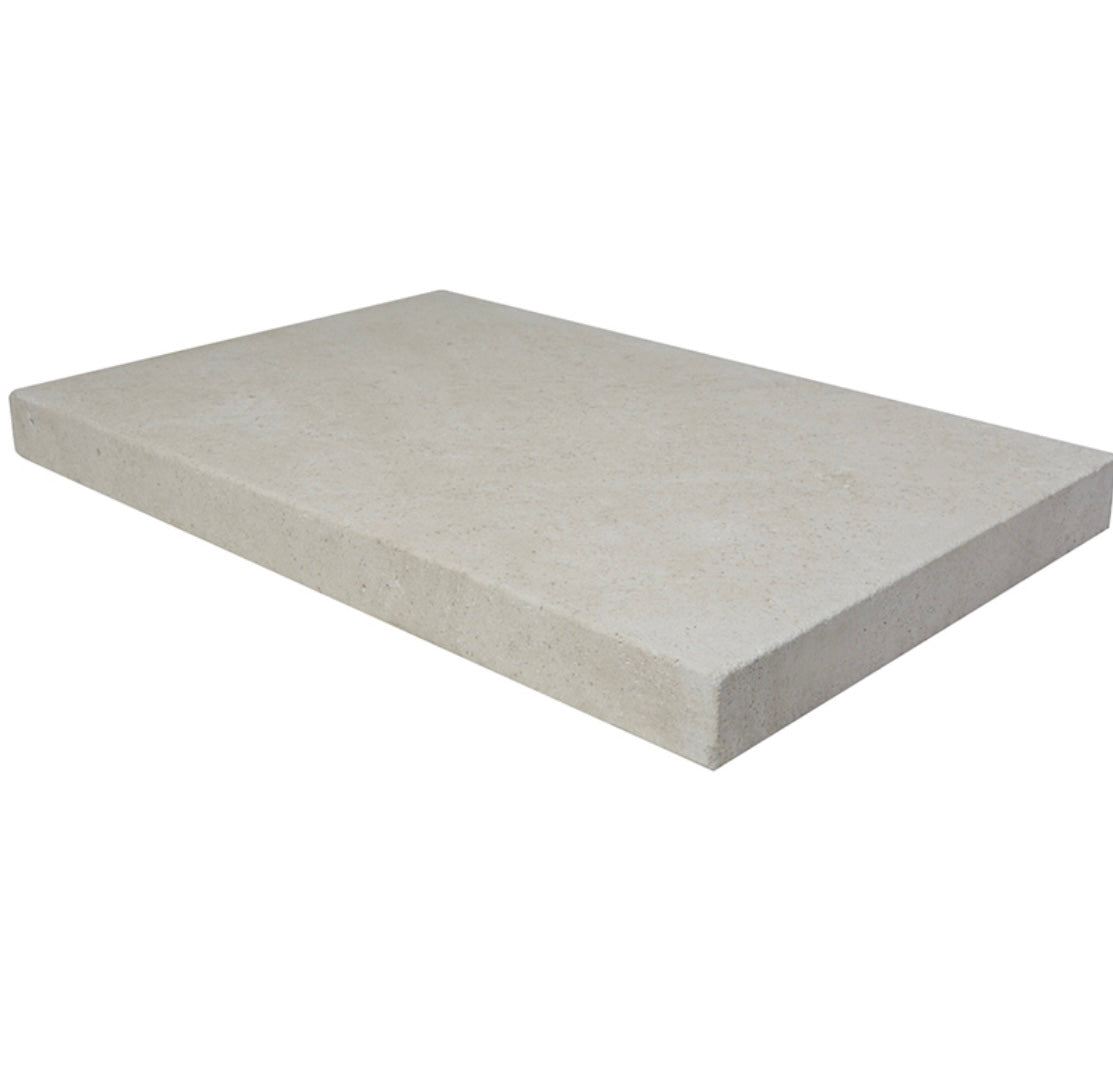 Close-up of Pearl Limestone showing clean modern edge and soft speckled surface