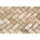 Tumbled travertine herringbone mosaic with neutral tones