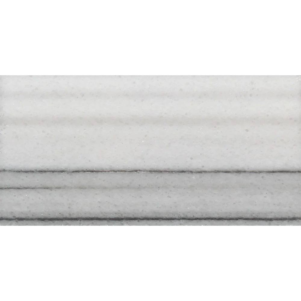 Close-up of 3x6 inch Polished Mink Marble Tile showing soft gray and taupe veining with a glossy finish.