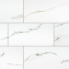 Flat lay of Praia Bianca 24x48 porcelain tile in polished finish, showcasing white base with soft gray marble veining