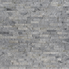 Close-up of natural quartzite surface showing mid-gray tones and stone variation