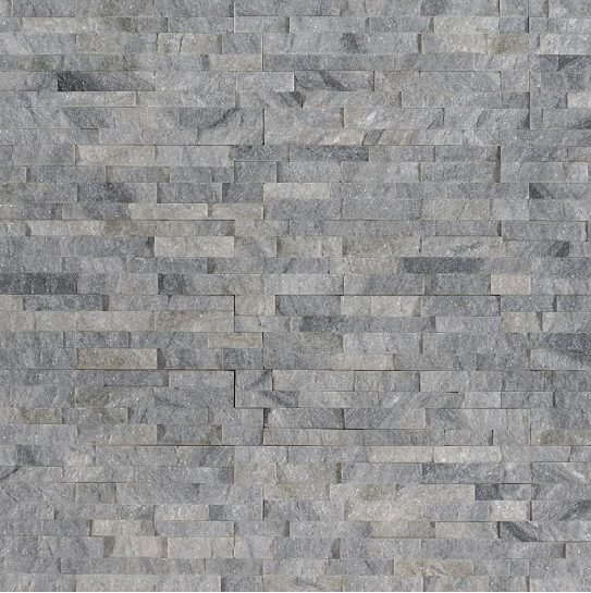 Close-up of natural quartzite surface showing mid-gray tones and stone variation