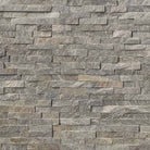 Flat lay of Sage Green quartzite stacked stone panel with split face texture