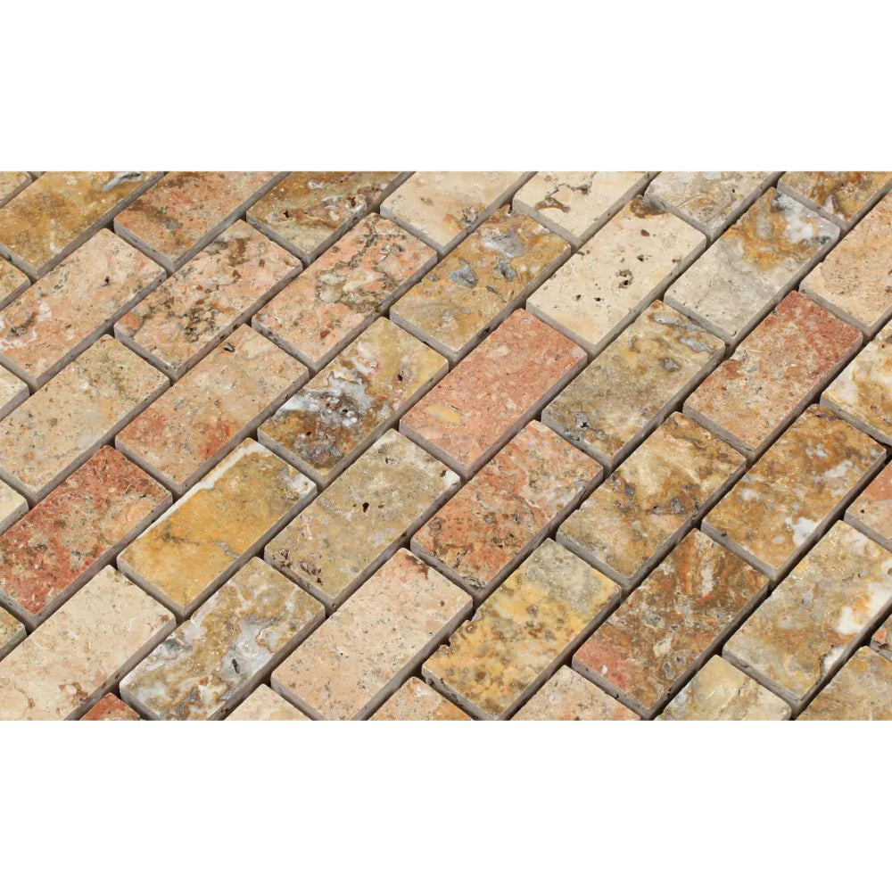 Close-up of polished 1x2 Scabos travertine mosaic showing natural variation