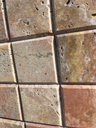 Close-up of Scabos 4x4 showing texture and earthy red-gold color blend