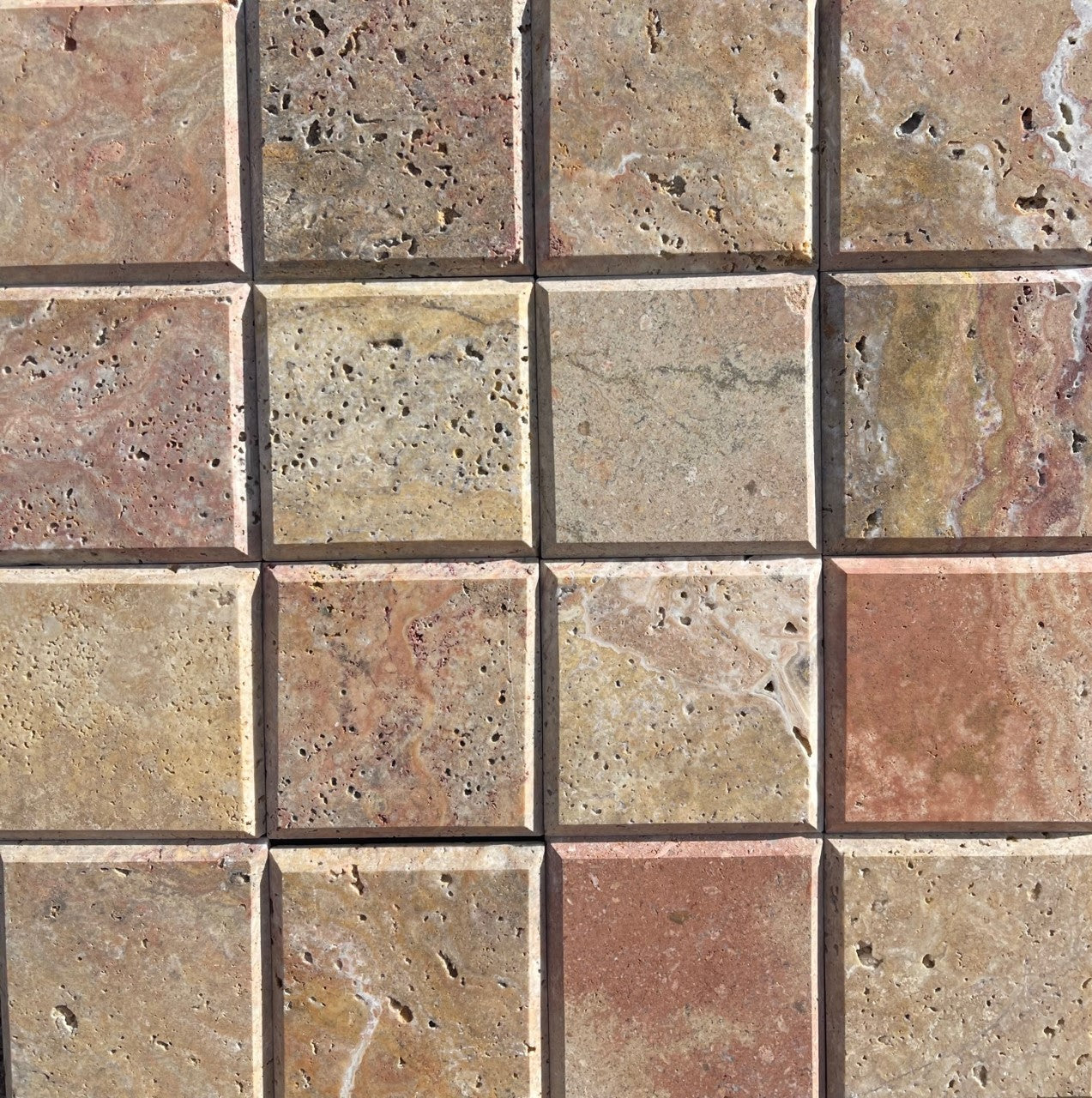 Flat view of Scabos Travertine 4x4 tile with deep bevel edge and honed finish