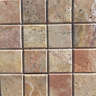 Flat view of Scabos Travertine 4x4 tile with deep bevel edge and honed finish