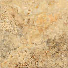 Close-up of Scabos 6x6 tile with tumbled finish and worn edges
