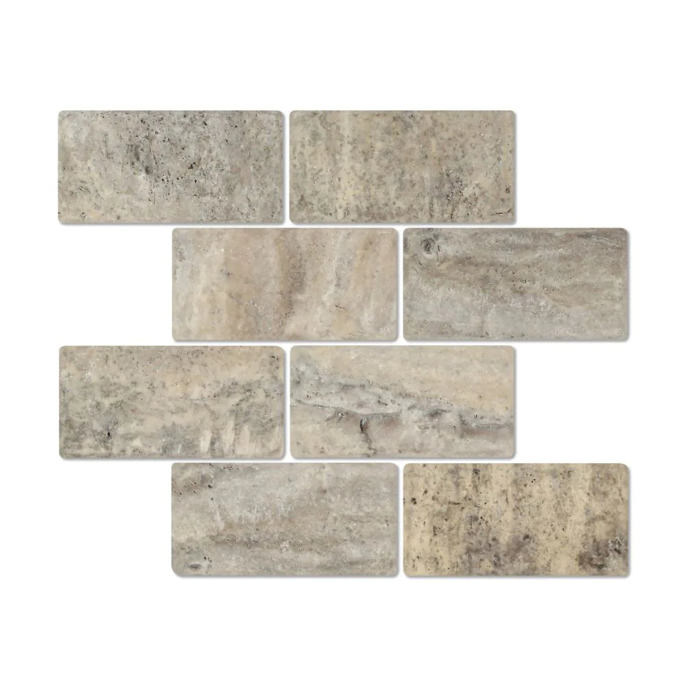 Flat view of Silver Travertine 3x6 tile in tumbled finish with gray-tan-cream tones
