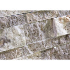 Close-up of Silver Travertine Stacked Stone Panel with rugged texture and color blend