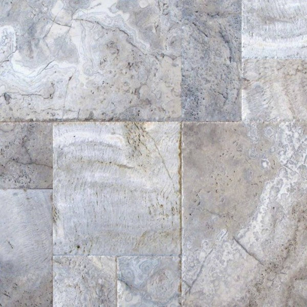 Close-up of Silver Travertine paver showing textured tumbled surface