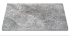 Close-up of Silver Travertine bullnose edge showing soft gray and white tones