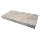 Close-up of Silver Travertine bullnose edge showing soft gray and white tones