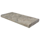 Close-up of Silver Travertine bullnose edge showing soft gray and white tones