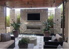 Silver Travertine Stacked Stone Panel installed on living room accent wall