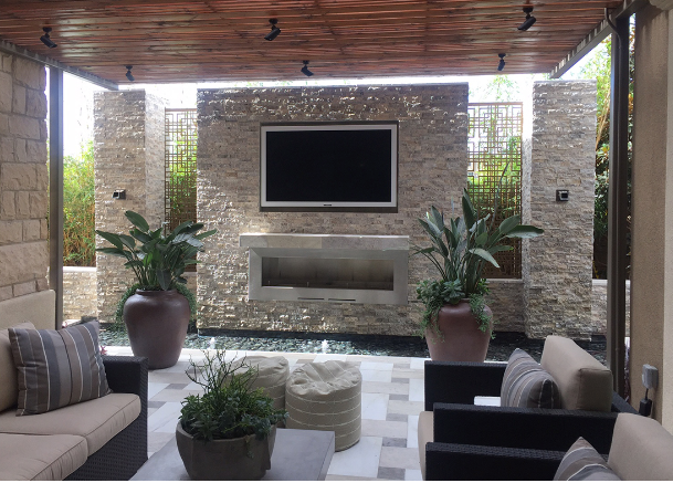 Silver Travertine Stacked Stone Panel installed on living room accent wall