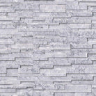 Flat lay of Statuarietto Capri 3D marble stacked stone panel with honed finish