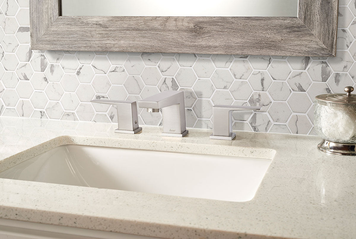 Close-up of Statuario Celano Mosaic showing marble-look veining on matte hexagon recycled glass tiles