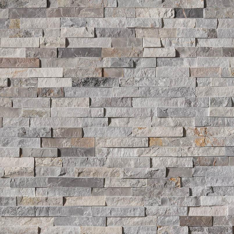 Flat lay of Sunset Silver quartzite stacked stone panel, 6x24 split face finish