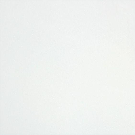 Close-up of Thassos White 12x12 tile showing bright white crystalline texture